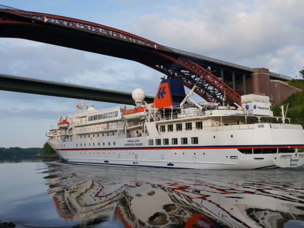 MS Seaventure as MS Bremen passing the Kiel Canal