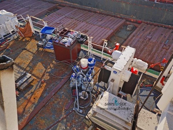 Boots-Deck of MS ASTOR with lots of housekeeping stuff next to the falls of lifeboat 5