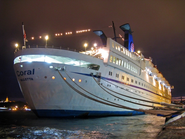 MS Coral docked at night