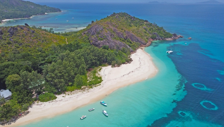 seychelles beach pristine waters sustainabilities