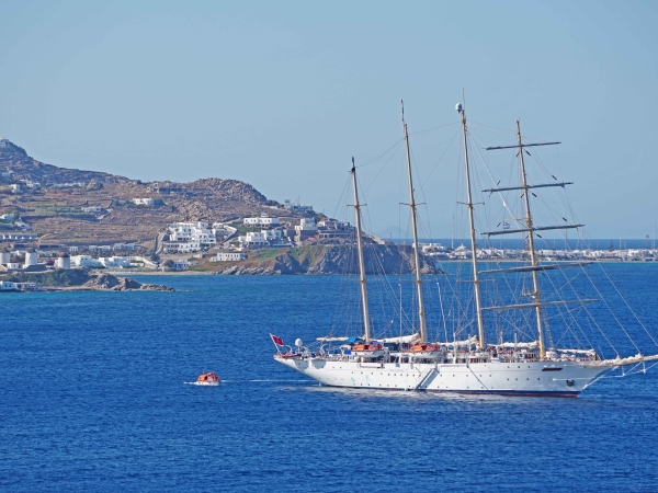 SPV Star Flyer of Star Clippers Cruises at anchor at the Mykonos windmills